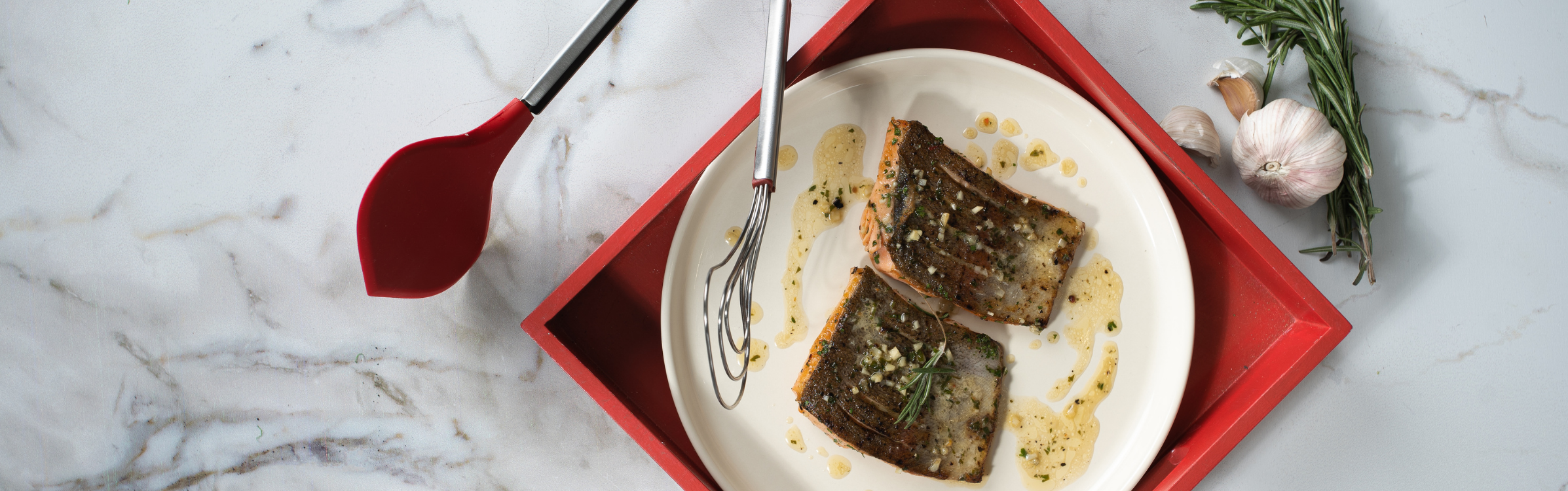 Garlic lemon butter and herb sauce trout, plated with Cuisipro Fish Tongs