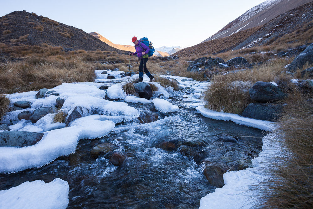 Crossing stream in winter