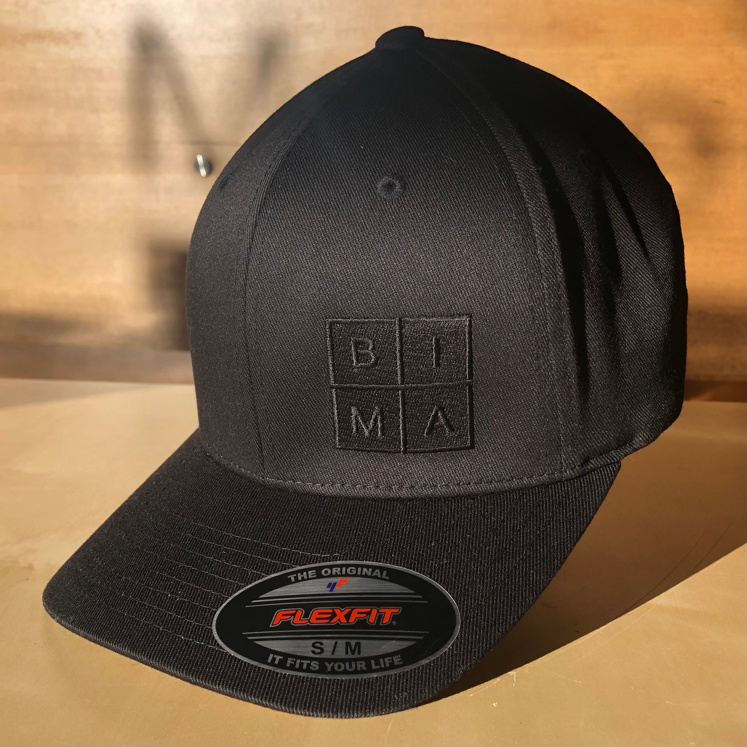  BIMA Logo Flexfit Cap in Blue 