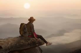 solo traveller overlooking landscape