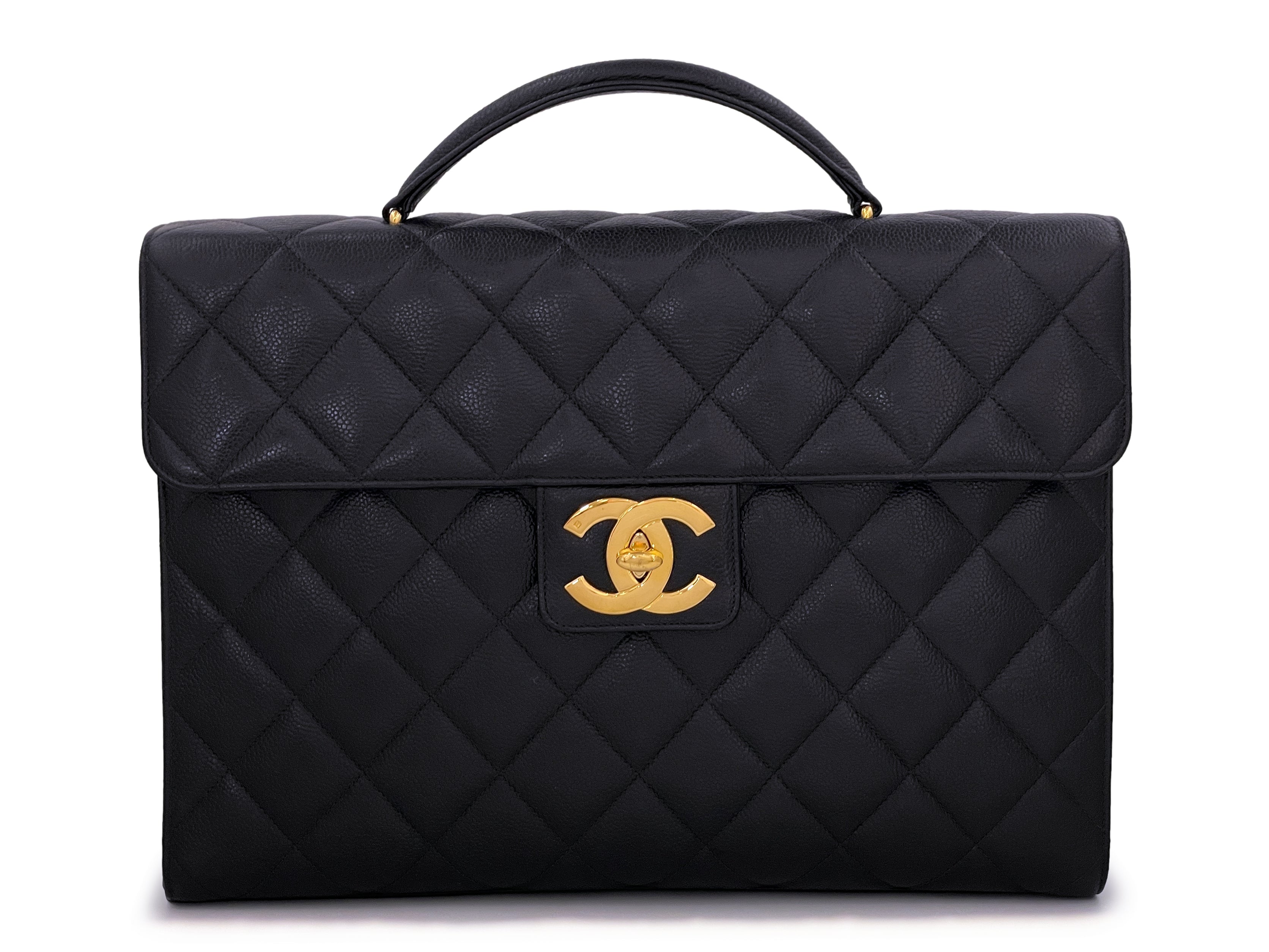 Authentic CHANEL caviar leather travel bag black