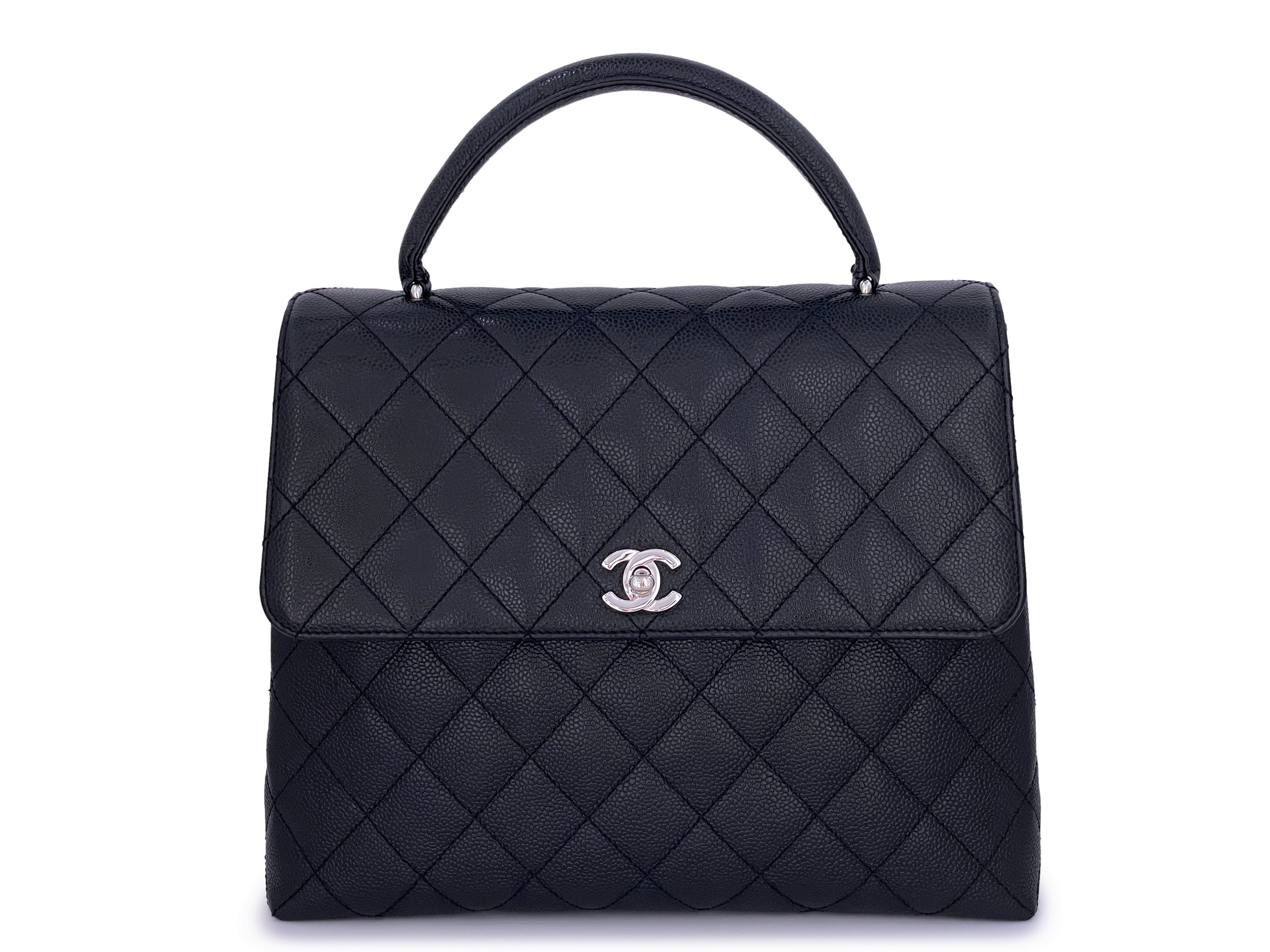 This Vintage Chanel Kelly Wave bag is a highly functional and