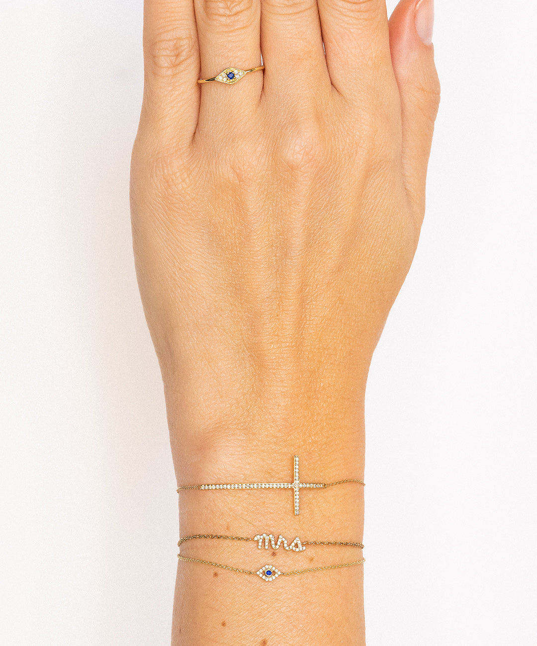 Magic Touch little cross bracelet in gold and diamonds – Djula.fr