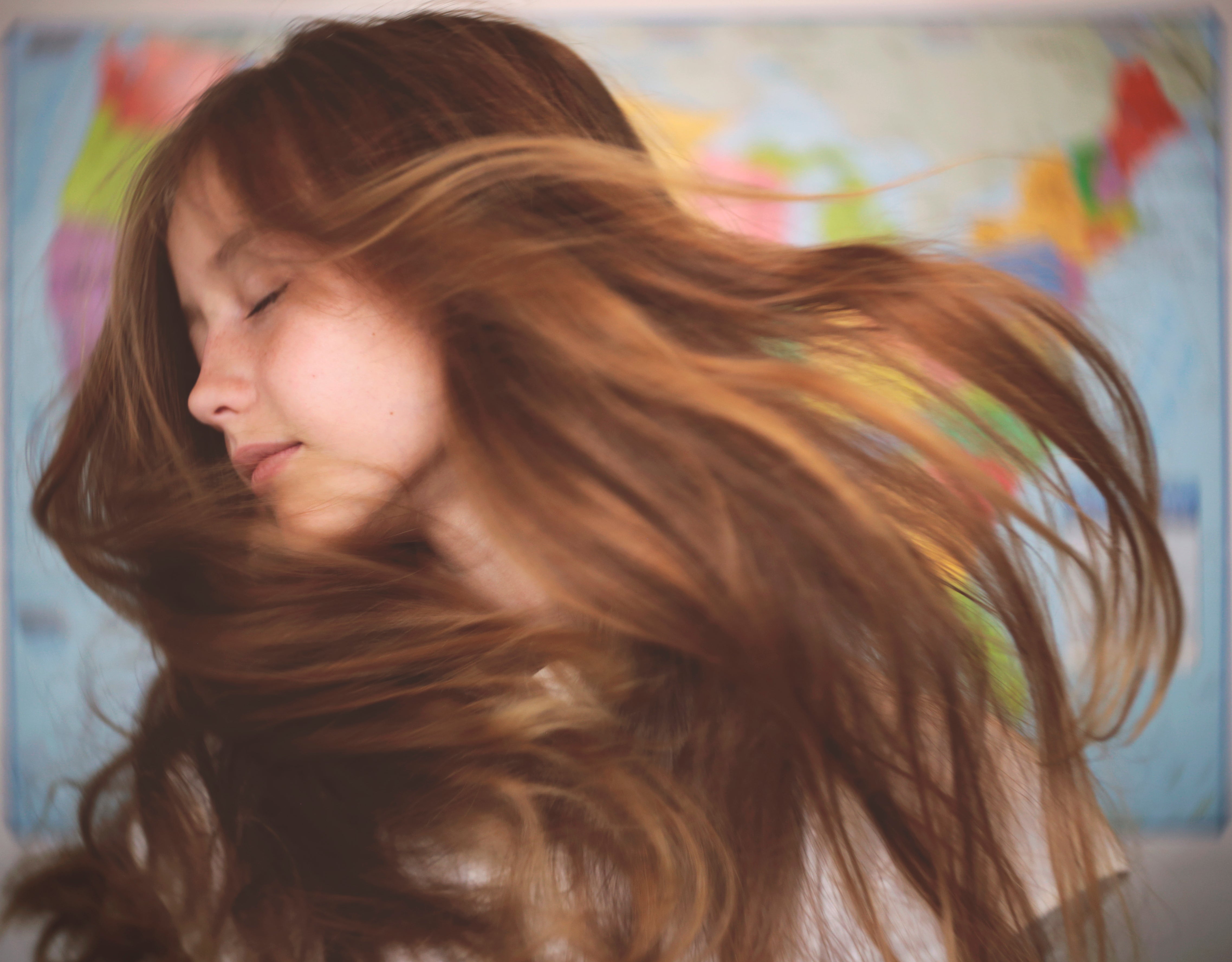 Twist 60 back to school photography. Girl waving hair