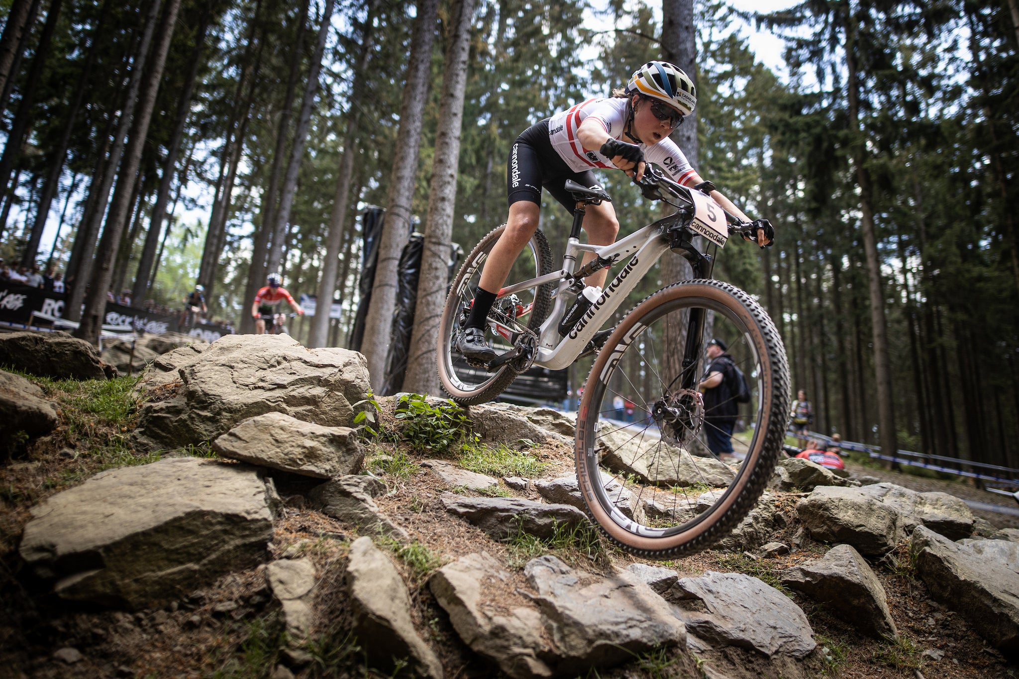 Female pro mountain biker racing at Crosscountry world cup SH-XC902