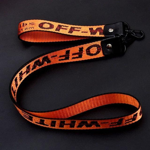 orange off white lanyard and keychain