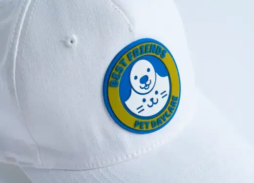 white cap with embroidered patches