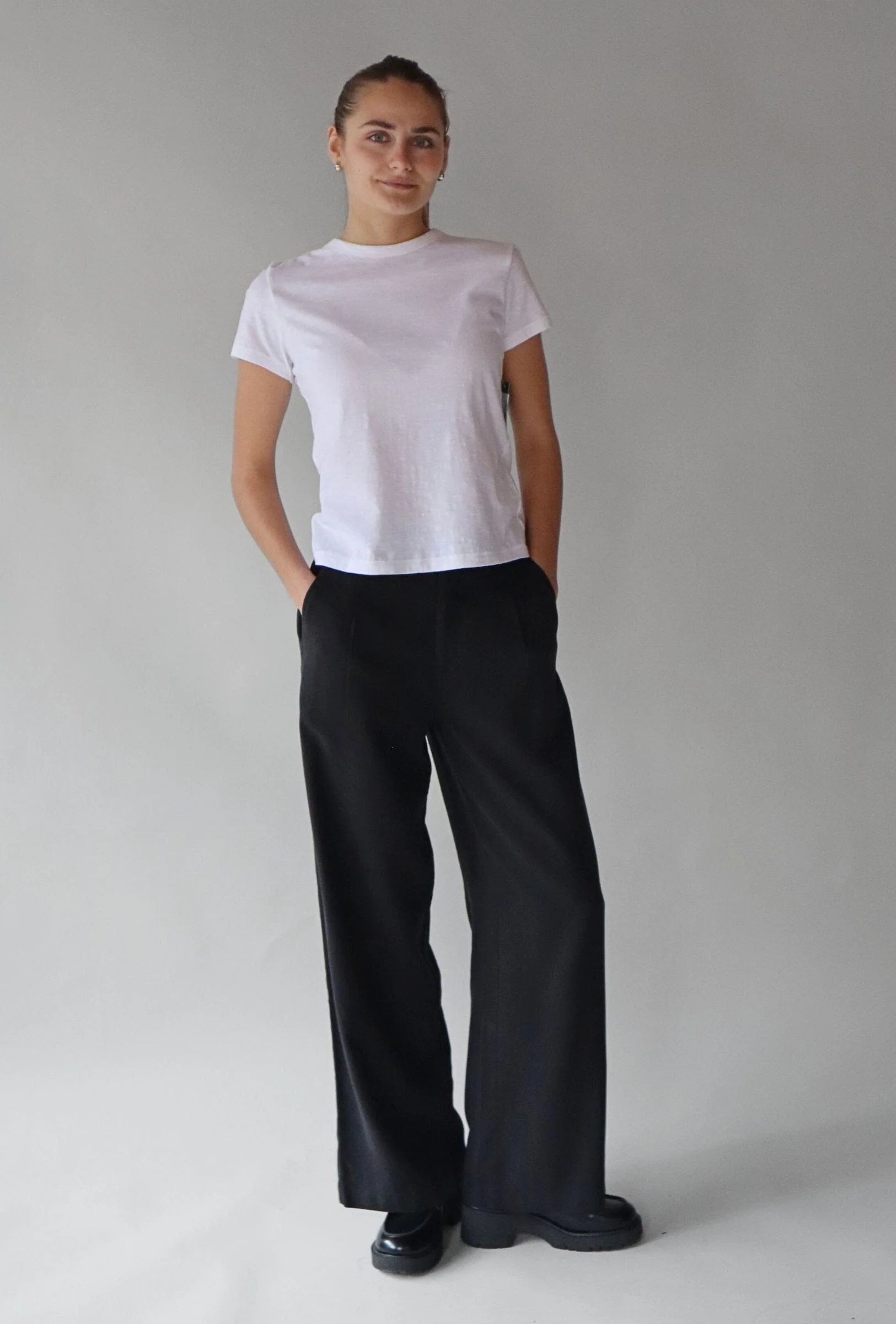 styling black trousers for a casual look