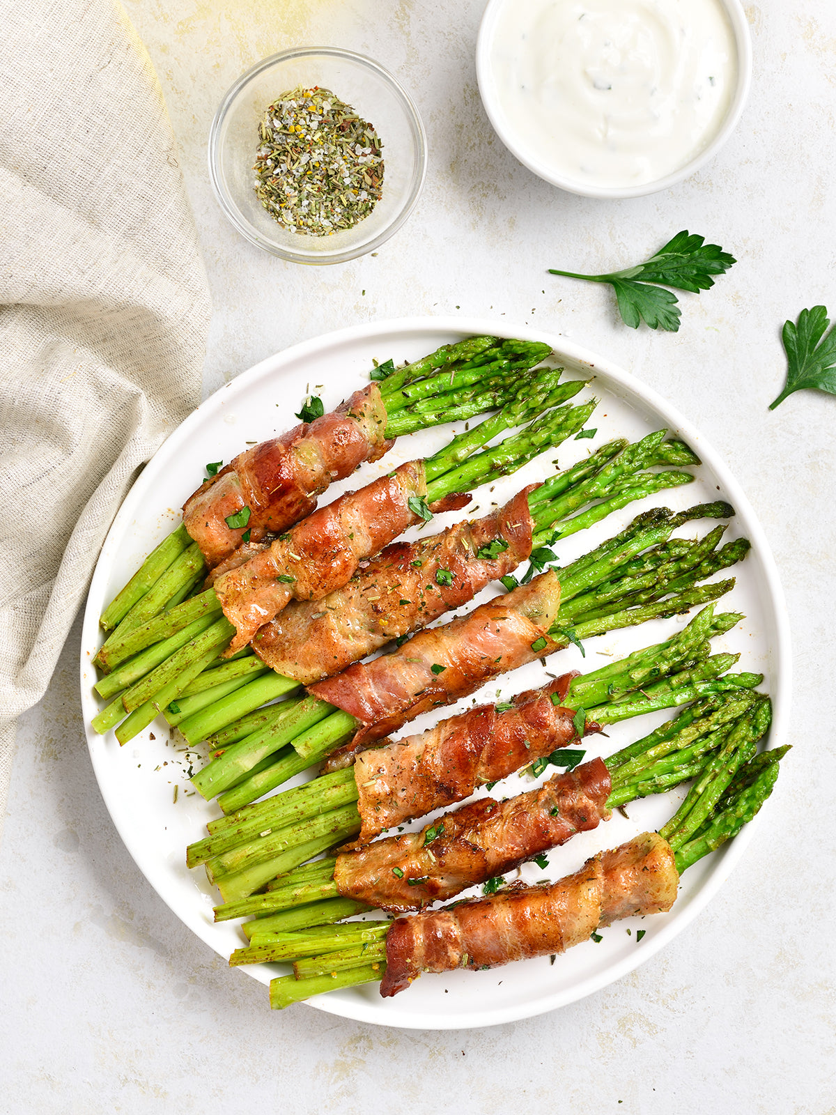 bacon wrapped asparagus on plate