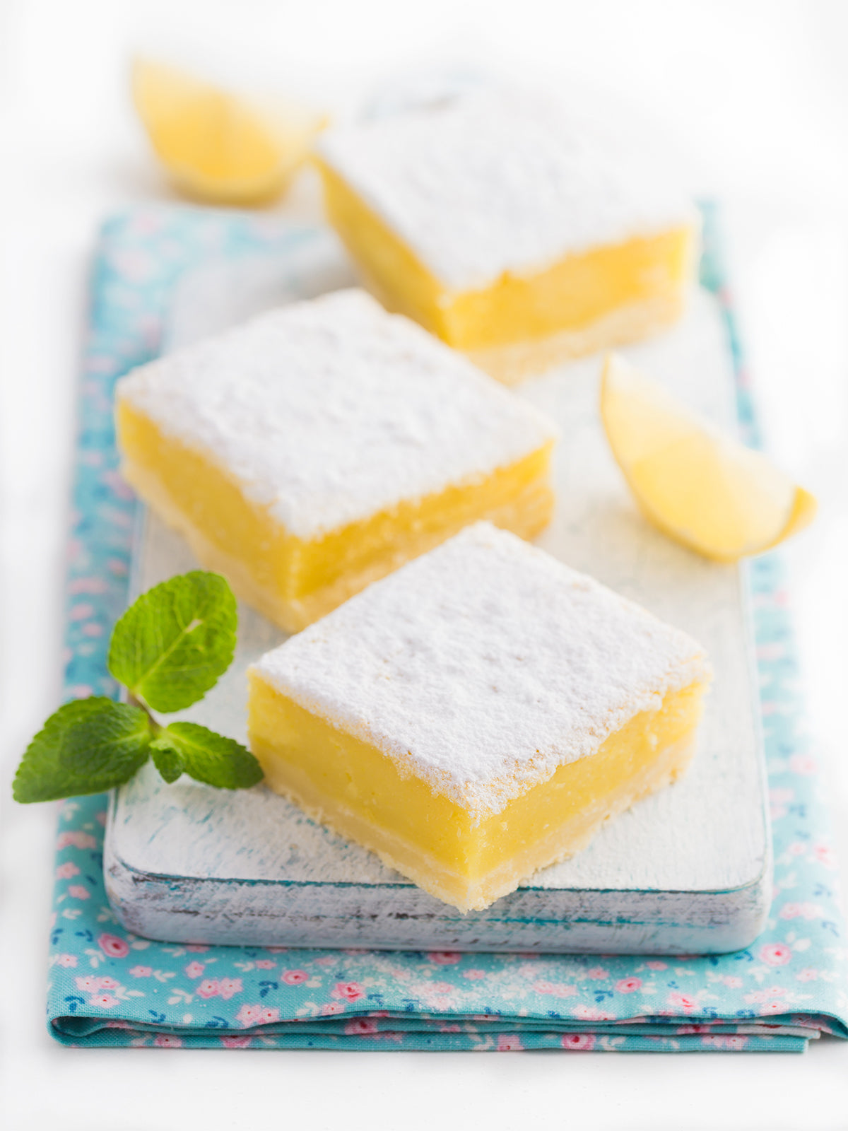 lemon squares dessert with powdered sugar