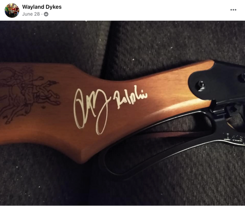 A Christmas Story bb gun autographed by Peter Billingsley, a christmas story family