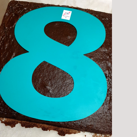 Number 8 Cake Stencil on Chocolate Cake