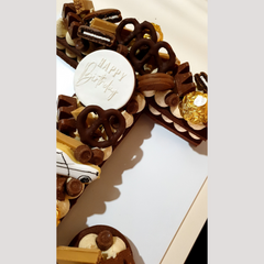 Close up image of letter T cookie cake toppers