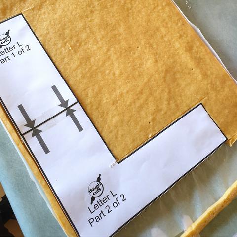 Cutting out a Letter Cake with A Template