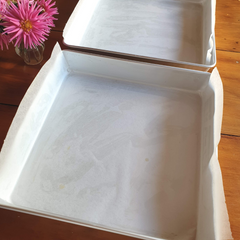 Lined 12" square cake tins.