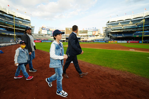 Oliver and family on the field at Yankee Stadium