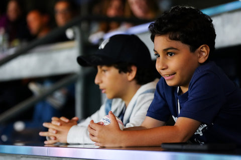 Oliver and Octavio Jr. watching the Yankees game