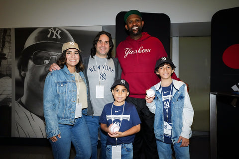 Oliver and family with CC Sabathia, the former Yankees pitcher