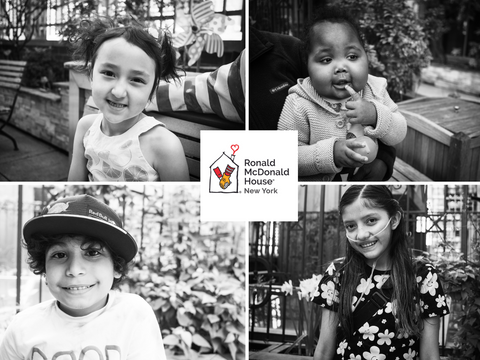 4 kids faces smiling at Ronald McDonald House New York