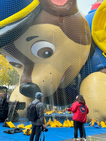 THe head of a cartoon character blown up for the parade