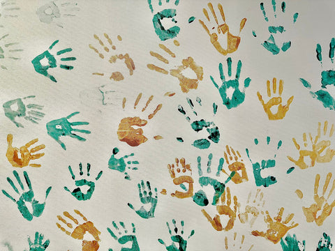 Green and Gold handprints represent the hands of support for all the kids fighting cancer at RMH-NY