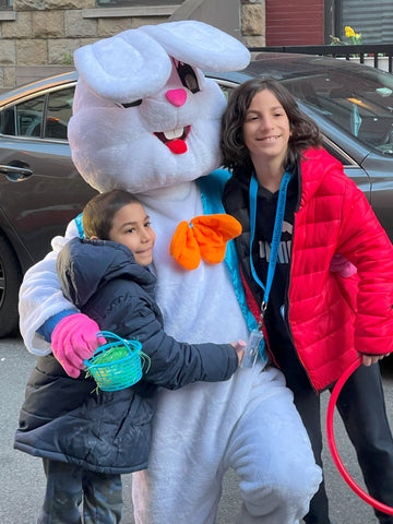 Oliver and Octavio pose with the easter bunny during Ronald McDonald House New York's Hoppy Spring