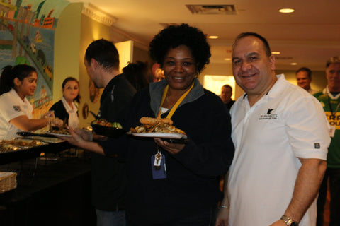 Franscisca and a volunteer at RMH-NY pose for a picture at dinner in the 2nd floor dining room