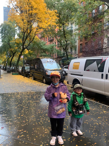 Jayden and Elias in the rain.
