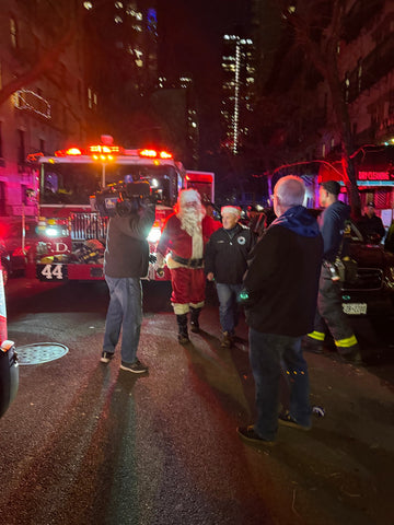 Santa fresh out of the fire truck