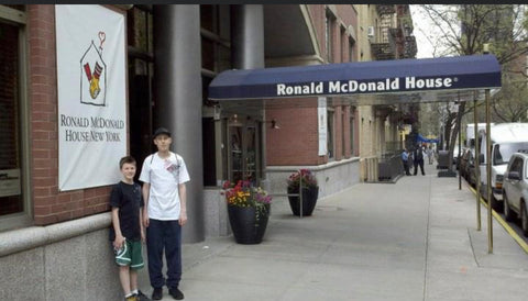 Sean standing outside Ronald McDonald House New York