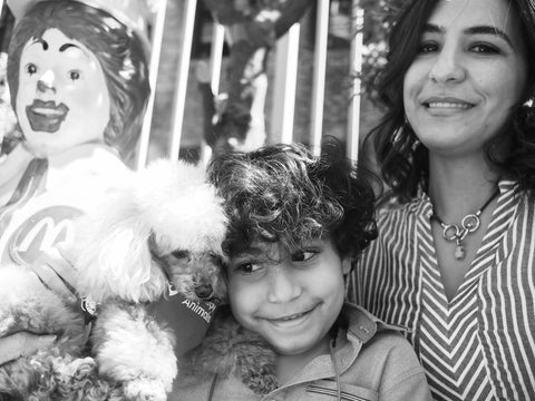 Oliver and Jennifer with dog on RMH-NY terrace