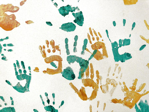 Greeen and Gold handprints supporting Childhood Cancer Awareness Month at Ronald McDonald House New York