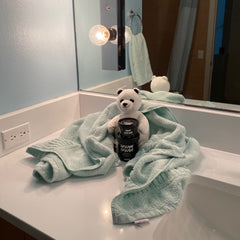 Stuffed Polar Bear with Lush Dream Cream Lotion in Black Recycled Pot