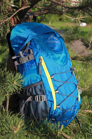 A blue Hiking Backpack with yellow lines