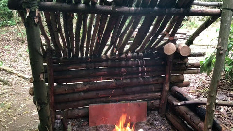 A campfire with a roof to shield from rain