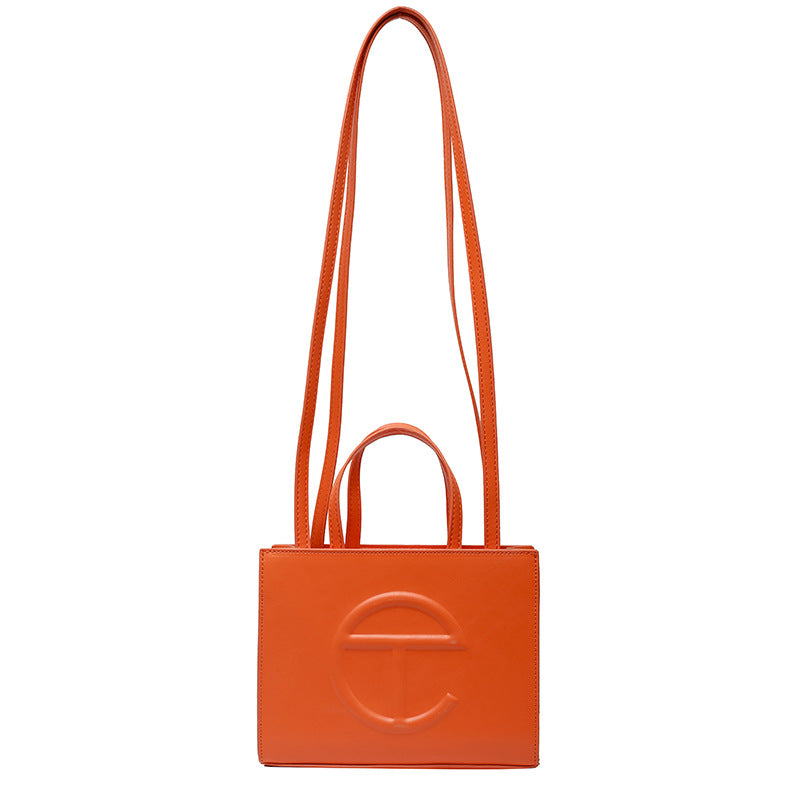 Cross message tote bags