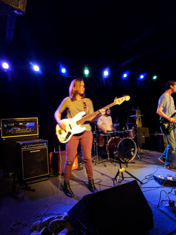 Chrissy plays on stage
