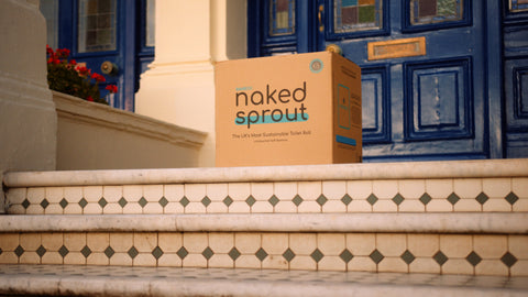 A box of Naked Sprout toilet rolls on a doorstep