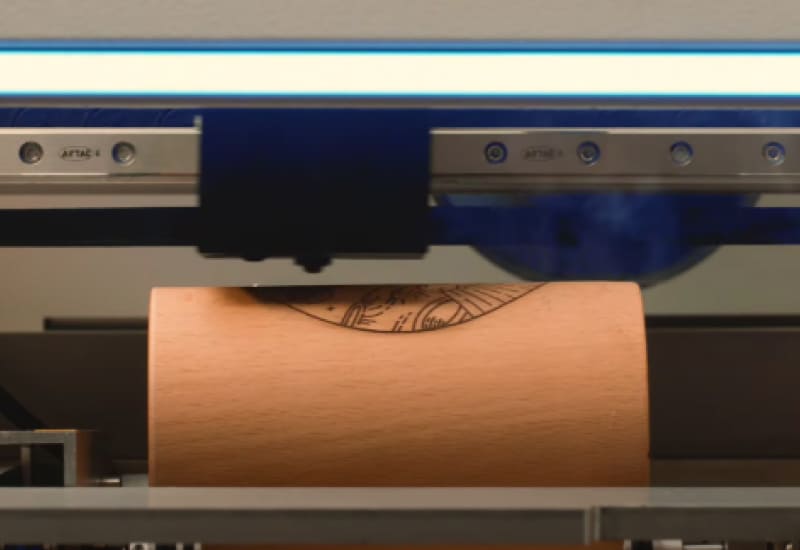 using a rotary laser engraver for laser engraving cylindrical objects
