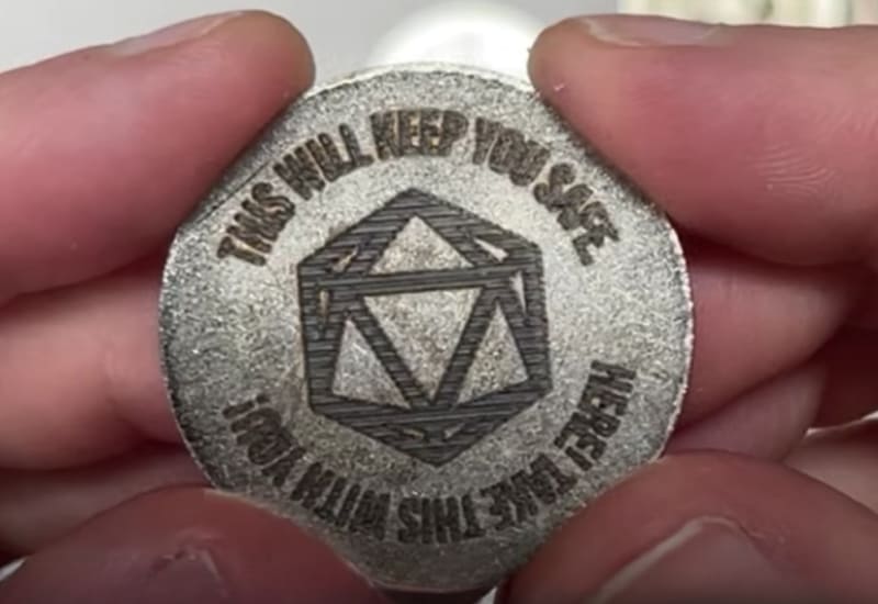 example of laser engraved stainless steel coin with variations