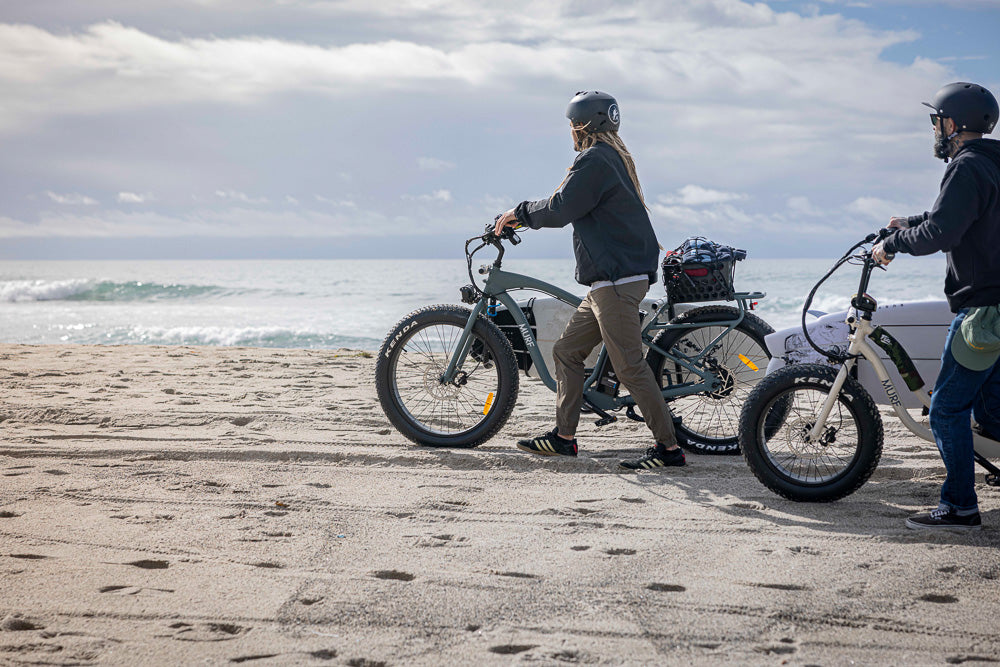 Austin and Nate pulling up to Trestles on their Murf Ebikes