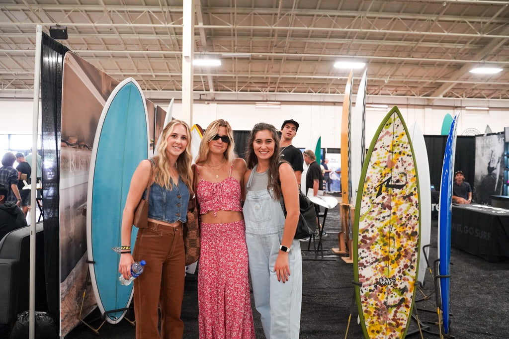 Girls at surfboard show