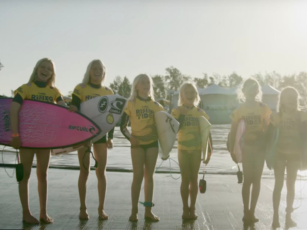 Surfer girls lined up