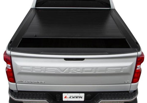 Pace Edwards Jackrabbit retractable tonneau cover partially open.