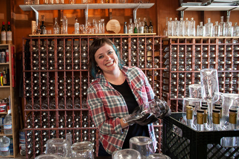 Rec Etch Tanessa examining decanters