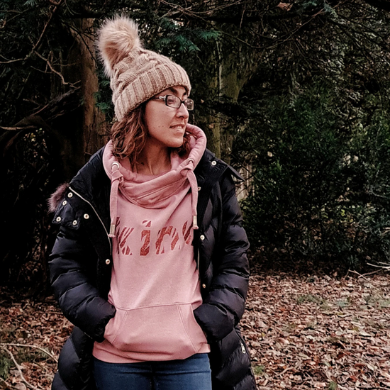 Mum Wearing A Kind Hoodie In The Forest