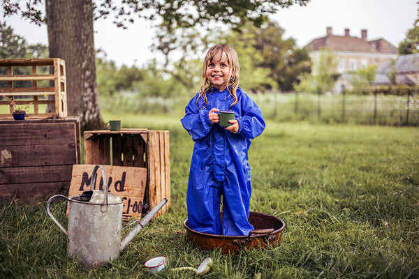 playing with mud kitchen