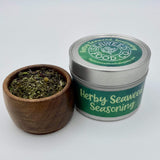 tin and wooden pot of herby seaweed seasoning