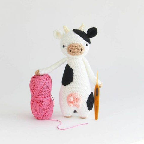 Tall Cow with yarn