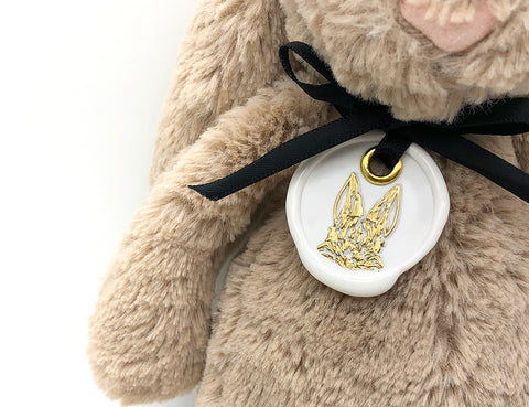 bunny wax seal tag on bunny stuff animal - gift wrapping idea for christmas